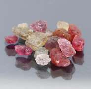 Mixed 16pc. 10.68ct unheated uncut Sapphire set