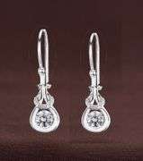 Love knot Platinum over 925 non tarnish sterling silver with dancing
