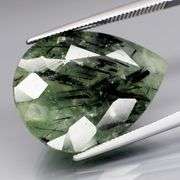 Superb 22.97ct rutilated Prehnite