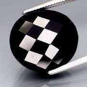 Elegant 8.02ct silky black Loas Tektite