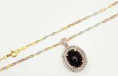 Sparkling 23.00 Carats Oval Cabochon-Cut Star Ruby & White Sapphire Pendant with a Tri-Tone Gold Plated Sterling Sliver Chain