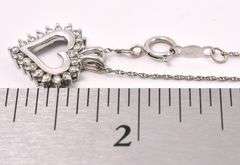 Elegant Heart Diamond Pendant In 14K White Gold