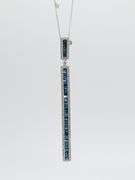 Tantilizing 18kt White Gold Necklace With Elongated Diamond and Saphire Pendant