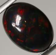 Block flashing 3.12ct black Opal cabochon