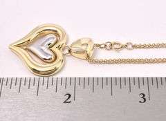 Angelic Spinning Heart Pendant Necklace In Two Tone 14K Gold