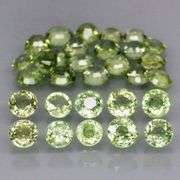 Awesome 5.97ct diamond cut GREEN Sapphire set