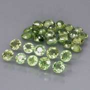 Fantastic 6.47ct diamond cut GREEN Sapphire set