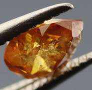 One of a kind! .33ct amber Diamond
