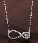 Infinity Dancing Stone Pendant in Platinum over Silver