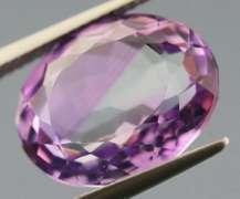 Halo flashing 10.83ct unheated Bolivian Amethyst