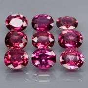 Ravishing 7.14ct violet pink Rhodolite Garnet set
