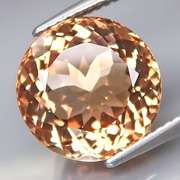 Impressive 8.54ct full fire eye clean Imperial Topaz solitaire