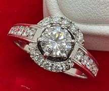CERTIFIED LADIES 18K WHITE GOLD AND DIAMOND RING