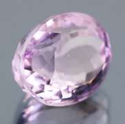 Glittering oval cut 13.65ct violet pink Amethyst