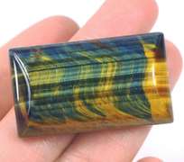 Dramatic 83ct Tiger Eye cabochon