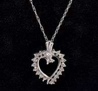 Enticing Heart Pendant Necklace In White Gold