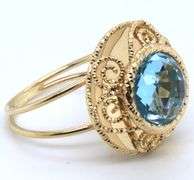 Charming Yellow Gold Blue Topaz Checkerboard Cut Swirl Ring