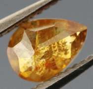 One of a kind! .33ct amber Diamond