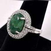 Brilliant 6.50CTS Oval Shaped Cabochon-Cut Emerald & 1.50CTW White Sapphire Ring in Sterling Silver