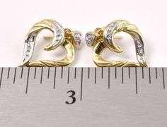 Striking Diamond Heart Dangle Earrings In Yellow Gold