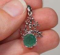Beautiful sterling silver and Emerald pendant