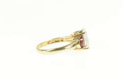 10K Yellow Gold Oval Syn. Opal Garnet Accent Statement Ring