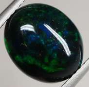 Glistening 2.36ct black Opal cabochon