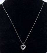 Elegant Heart Diamond Pendant In 14K White Gold