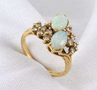 Feminine Opal and Diamond Ring