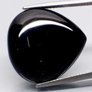 Elegant 23.12ct silky black Tektite cabochon