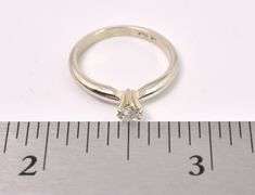 Elegant Solitaire Diamond Ring In 14K White Gold