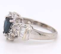 Attractive White gold Pear Shaped Sapphire and Diamond Halo Cocktail Ring