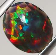Rainbow flashing! 1.24ct black Opal