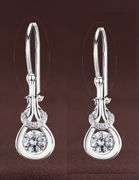 Love knot Platinum over 925 non tarnish sterling silver with dancing