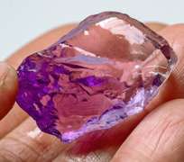Gorgeous 57.4ct rich violet uncut Amethyst