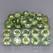 Fantastic 6.47ct diamond cut GREEN Sapphire set