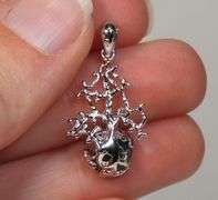 Beautiful sterling silver and Emerald pendant