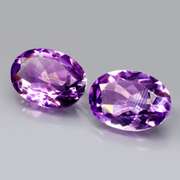 Glittering 9.93ct violet Amethyst pair