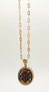 Sparkling 23.00 Carats Oval Cabochon-Cut Star Ruby & White Sapphire Pendant with a Tri-Tone Gold Plated Sterling Sliver Chain