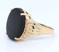 Attractive Black Onyx and Diamond Accent Ring in Yellow Gold