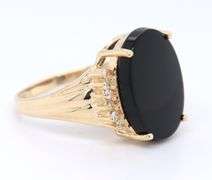 Attractive Black Onyx and Diamond Accent Ring in Yellow Gold