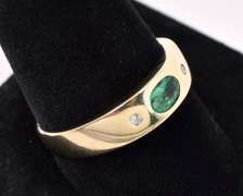 Sturdy Emerald Ring In 14K Yellow Gold