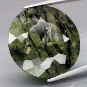 Really cool 20.58ct heavily rutilated Prehnite