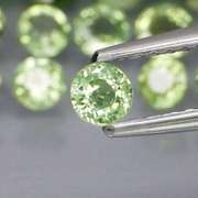 Fantastic 6.47ct diamond cut GREEN Sapphire set