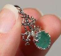 Beautiful sterling silver and Emerald pendant