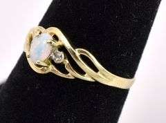 Fine Opal And Diamond Ring In Yellow Gold