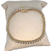 10K GOLD TENNIS S BRACELET WITH DIAMONDS