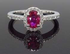 Oval Ruby & Diamond Halo Ring