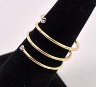 Elegant Spiral Ring In 14K Yellow Gold.