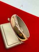 14K GOLD BANGLE BRACELET. HEAVY AND LARGE